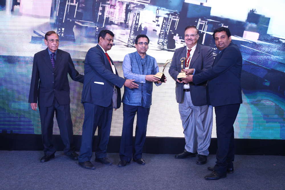 D-LINK INDIA receiving the award for BEST NETWORKING SWITCH COMPANY and EDITORS CHOICE AWARD FOR BEST STRUCTURE CABLING VENDOR from Air Cmde ( Retd.) 