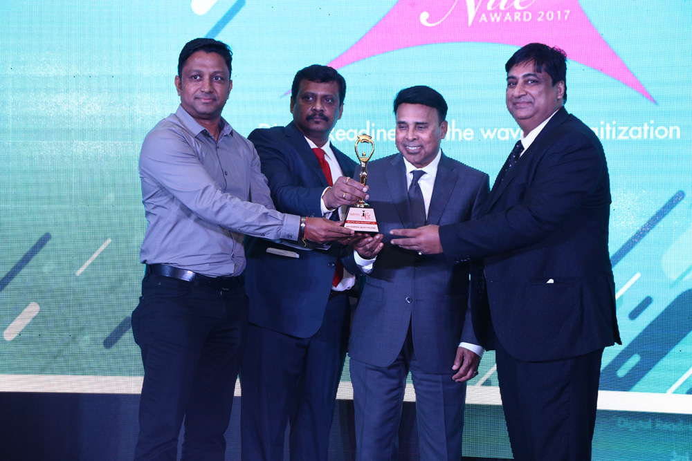 MCAFEE INDIA receiving the award for BEST ENTERPRISE SECURITY SOLUTIONS from Mr. Deepak Sahu, Publisher & Group Editor, VARINDIA and SPOI, Mr.Dan Mish
