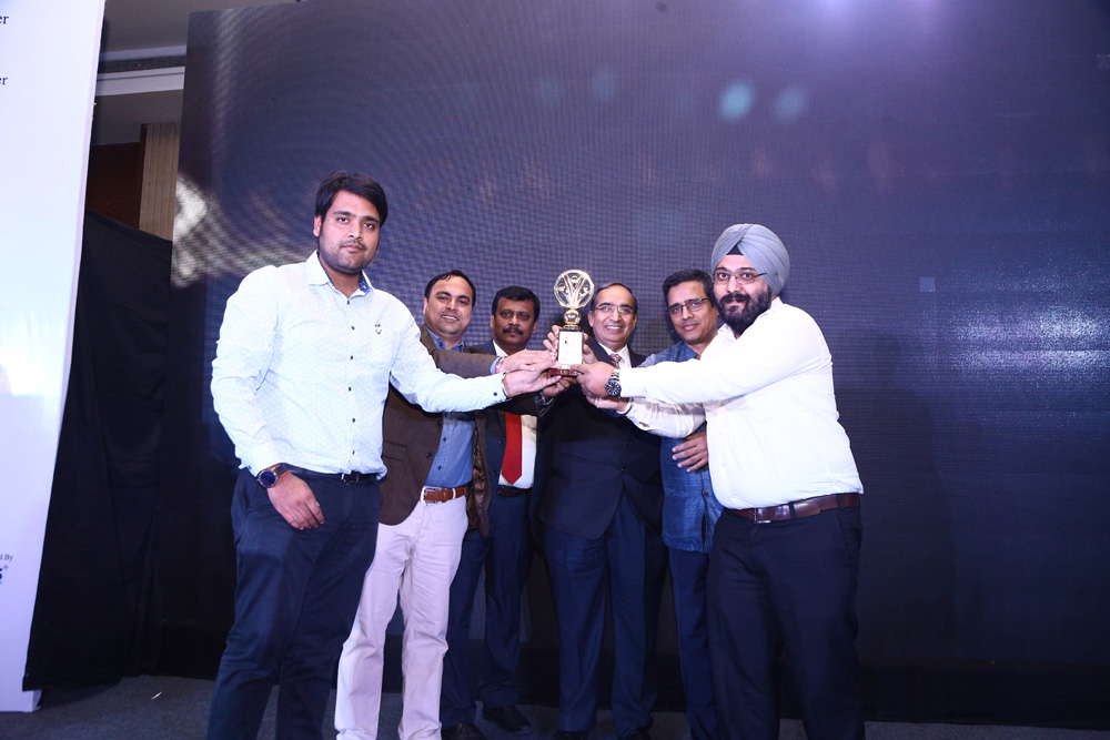 COMMSCOPE SOLUTIONS receiving the award for BEST STRUCTURE CABLING COMPANY from Mr. Vipin Tyagi, Executive Director – C-DOT, Mr. Vinit Goenka, Member-