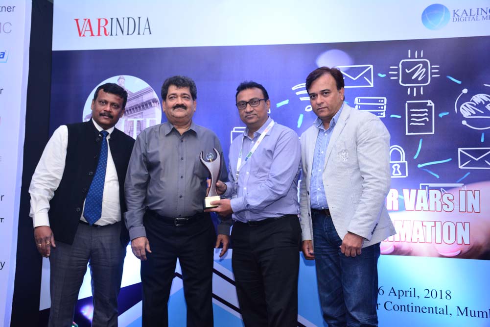 Creative Peripherals & Distribution Ltd receives the award for Best Regional Distributor  from Mr. Champak Raj Gurjar, President - FAIITA; Mr. Yugal K