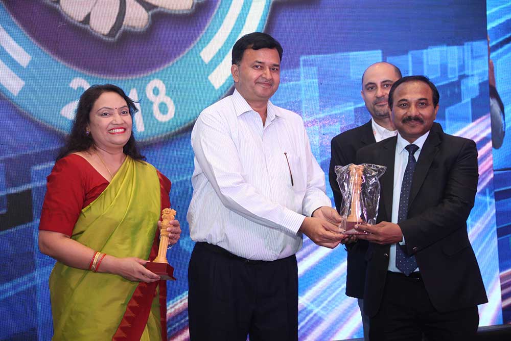 Shailendra Choudhary, Vice President & Head - I.T., Interarch Building Products receives the Eminent CIO of India 2018 award from Mr. S.N Tripathi, Se