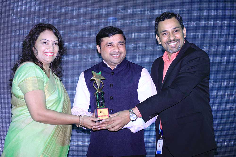 Comprompt Solutions LLP receiving the award for the Best Security Partner at VAR Symposium - 17th Star Nite Awards 2018