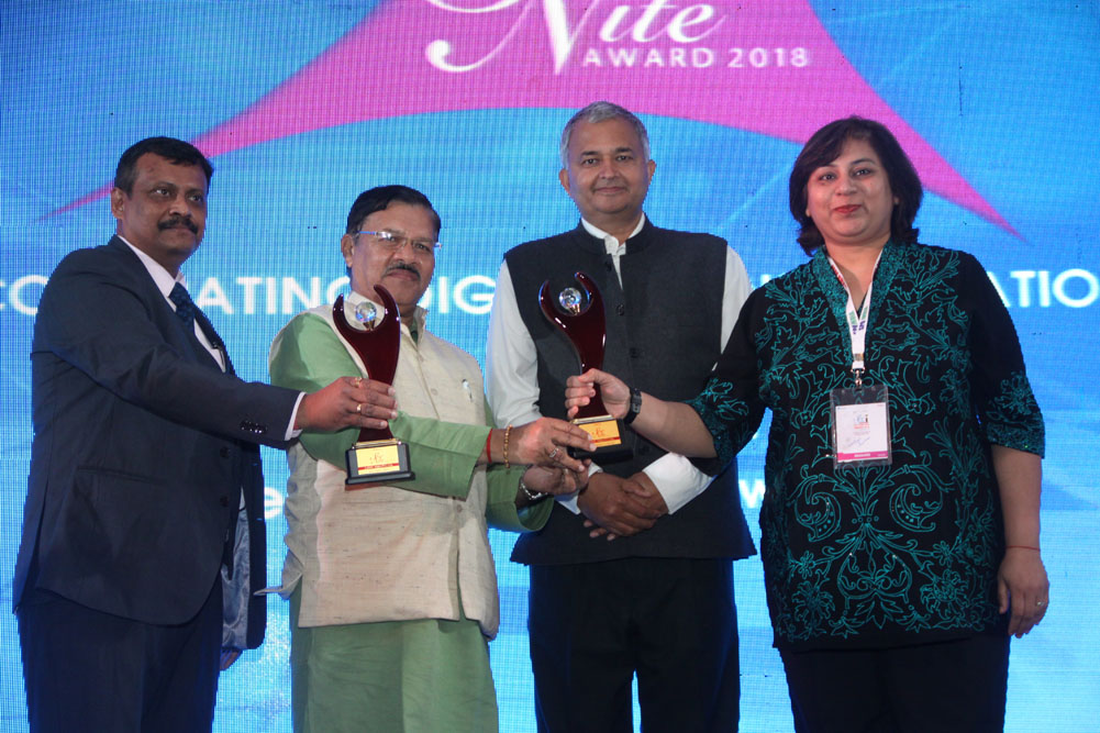 Canon India receiving the award for Best photo copier & Best Imaging Solution Company at 17th Star Nite Awards 2018