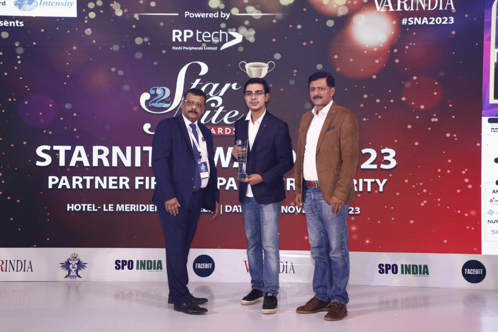 Representative receiving the CMO award on behalf of Anupam Sah, GM-Marketing - Aditya Infotech Pvt. Ltd.