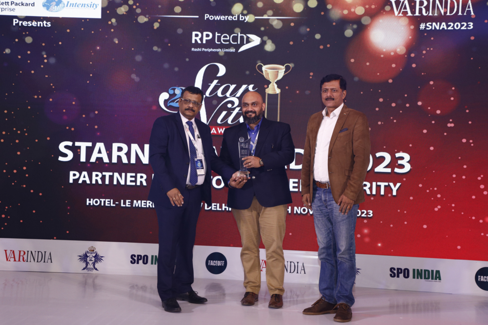 Representative receiving the CMO award on behalf of Nagesh Belur,CMO- Ivalue Group