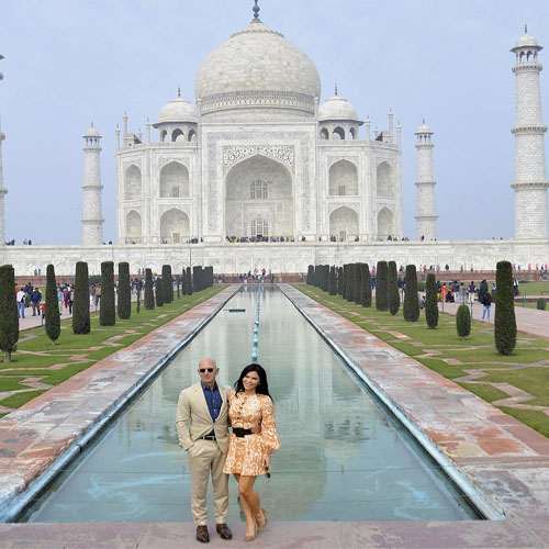 Amazon founder and his girlfriend pose in front of Taj Mahal